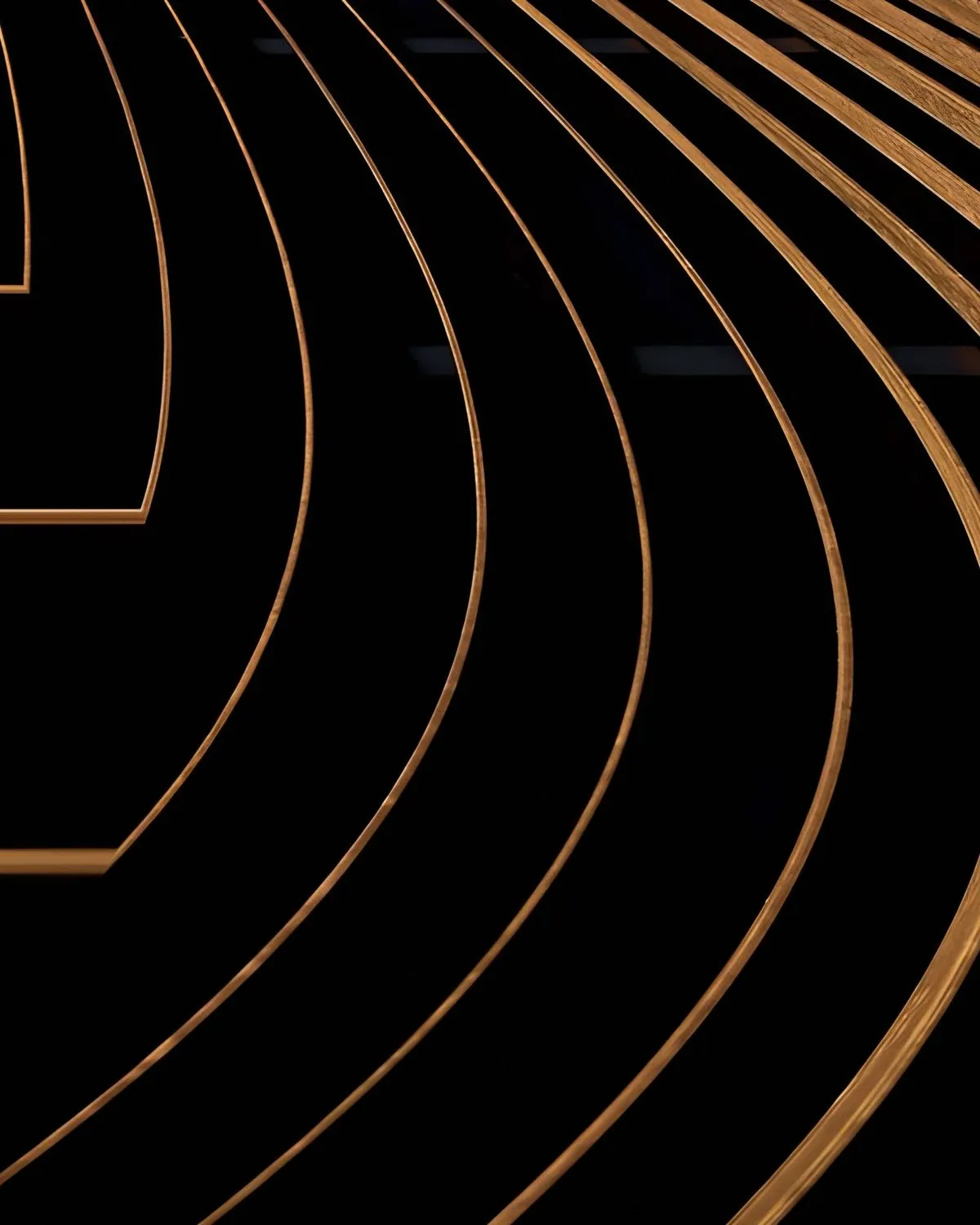 Curved wooden lanes on black